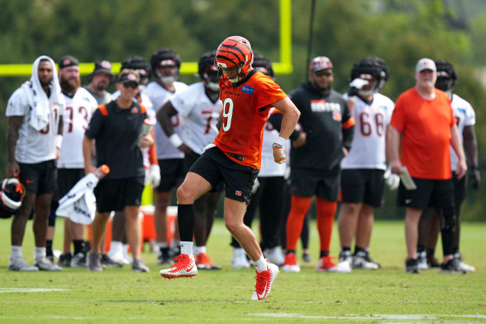 July 27, 2023; Cincinnati, OH, USA; Cincinnati Bengals quarterback Joe Burrow (9) suffers an injury on this scramble play during Cincinnati Bengals training camp practice, Thursday, July 27, 2023, at the practice fields next to Paycor Stadium in Cincinnati. Mandatory Credit: Kareem Elgazzar-USA TODAY NETWORK